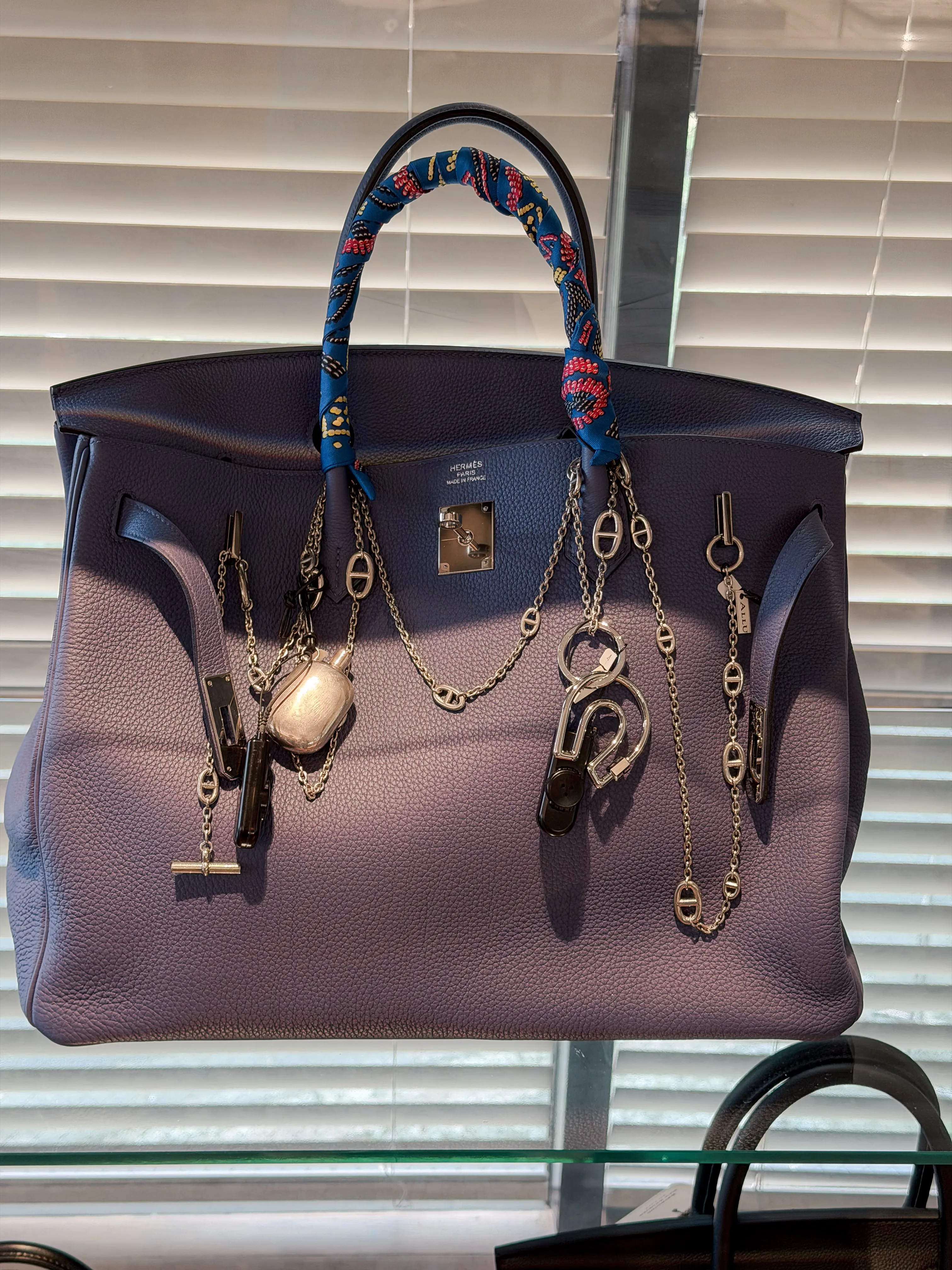 Hermès Birkin styled with silver jewelry at ALLU